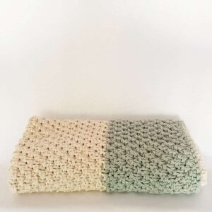 Handknitted two-tone luxe cotton baby blanket