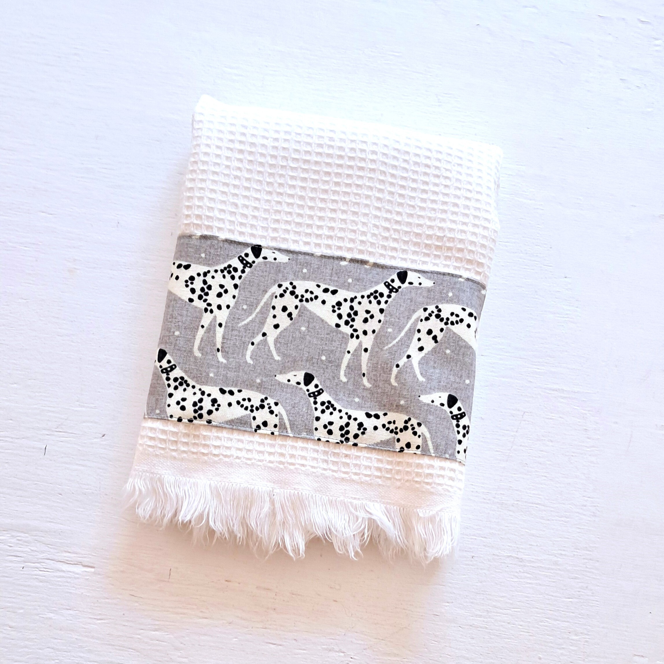 Luxury waffle guest towel with Dalmatian detail Luxury waffle guest towel with Dalmatian detail